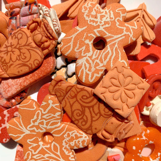 Baked polymer clay pieces - Orange LOT